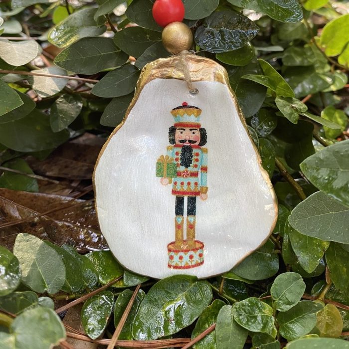 Blue Nutcracker with Gift Oyster Christmas Ornament